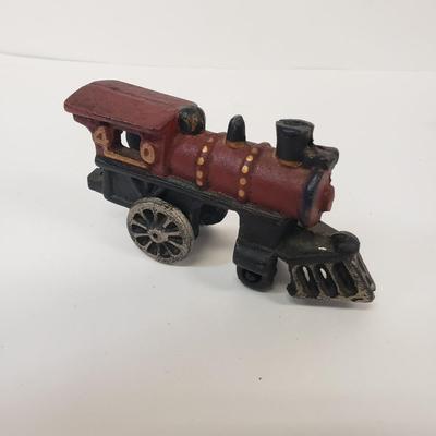 LOT 77: Vintage Cast Iron Train Set