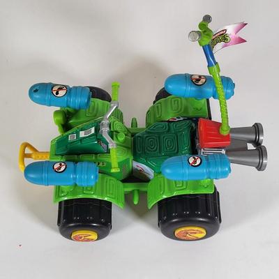 LOT 86: Vintage Teenage Mutant Ninja Turtles Toy Lot Including Pez Dispensers, Handheld Videogame and More
