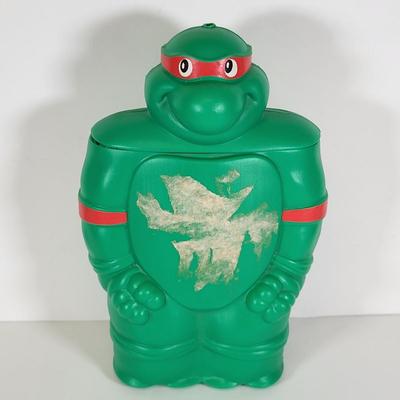 LOT 86: Vintage Teenage Mutant Ninja Turtles Toy Lot Including Pez Dispensers, Handheld Videogame and More