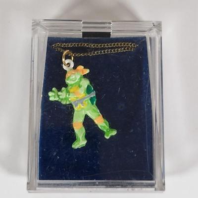 LOT 86: Vintage Teenage Mutant Ninja Turtles Toy Lot Including Pez Dispensers, Handheld Videogame and More