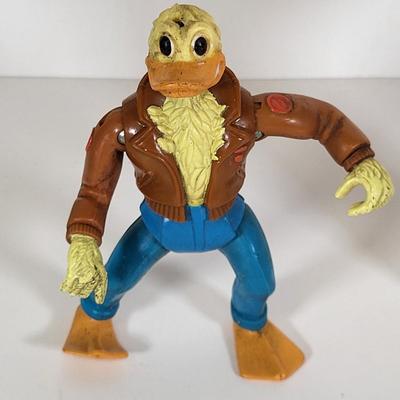 LOT 86: Vintage Teenage Mutant Ninja Turtles Toy Lot Including Pez Dispensers, Handheld Videogame and More