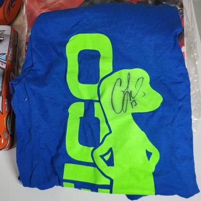 LOT 96: Nascar Memorabilia Lot Including Autographed Geico T-shirt, Toy Replicas and More