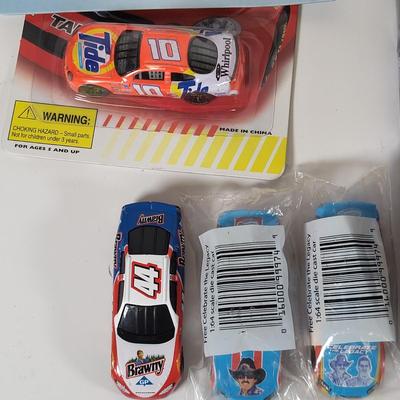 LOT 96: Nascar Memorabilia Lot Including Autographed Geico T-shirt, Toy Replicas and More
