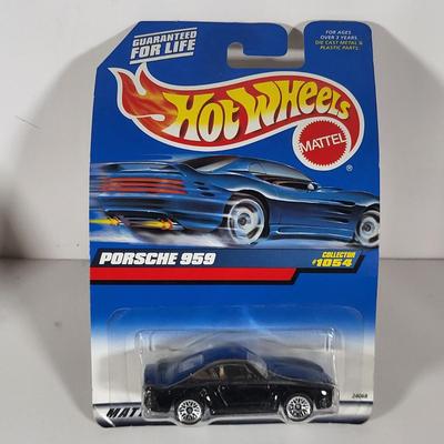 LOT 99: Seven Vintage Hot Wheels Lot Featuring 56' Ford Truck, Porsche 959 and More