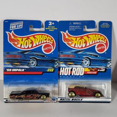 LOT 100: Eight Vintage Hot Wheels Lot Featuring 59' Impala, Santa Clause Rodger Dodger and More