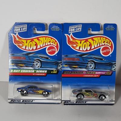 LOT 100: Eight Vintage Hot Wheels Lot Featuring 59' Impala, Santa Clause Rodger Dodger and More