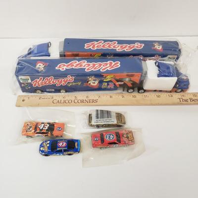 LOT 111: Collection of Kellogg's Cereal Box Toy Cars & Trucks