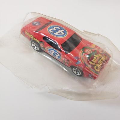 LOT 111: Collection of Kellogg's Cereal Box Toy Cars & Trucks