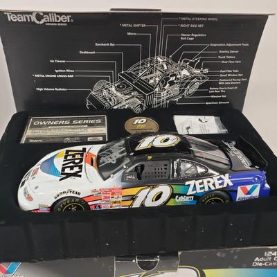 LOT 120: Limited Edition Pontiac Grand Prix with Autographed Cards by Johnny Benson