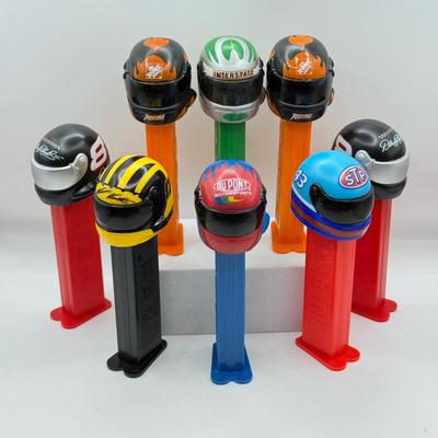 LOT 128: Car Racing Helmets Pez Dispensers