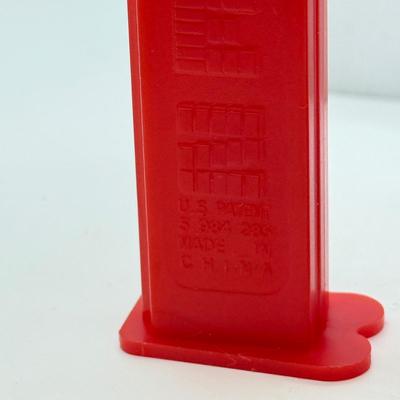LOT 128: Car Racing Helmets Pez Dispensers
