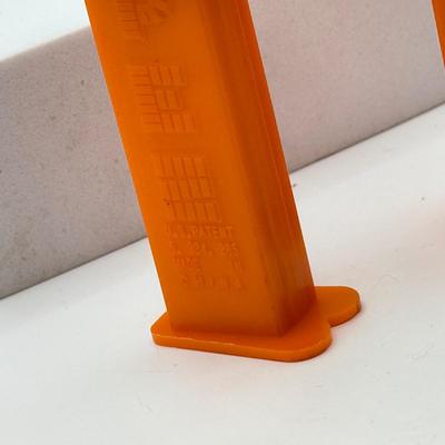 LOT 128: Car Racing Helmets Pez Dispensers