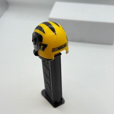LOT 128: Car Racing Helmets Pez Dispensers