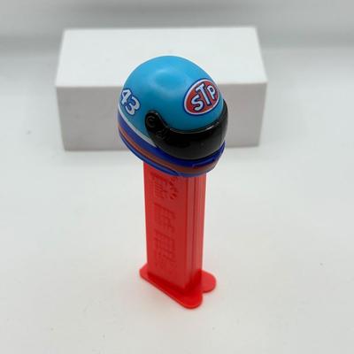 LOT 128: Car Racing Helmets Pez Dispensers