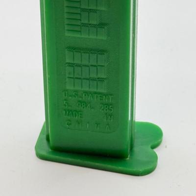 LOT 128: Car Racing Helmets Pez Dispensers