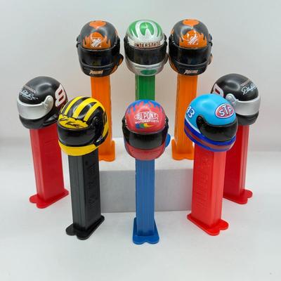 LOT 128: Car Racing Helmets Pez Dispensers