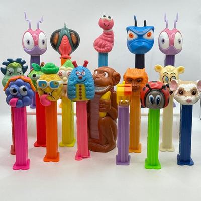 LOT 132: Pez Dispenser Collection: Funny Fruit, Bugs, Worm & More