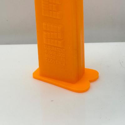LOT 132: Pez Dispenser Collection: Funny Fruit, Bugs, Worm & More