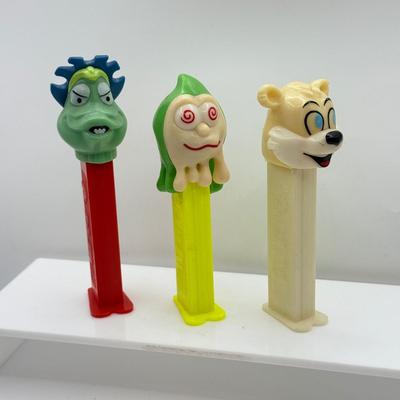 LOT 132: Pez Dispenser Collection: Funny Fruit, Bugs, Worm & More