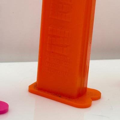 LOT 132: Pez Dispenser Collection: Funny Fruit, Bugs, Worm & More