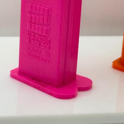 LOT 132: Pez Dispenser Collection: Funny Fruit, Bugs, Worm & More