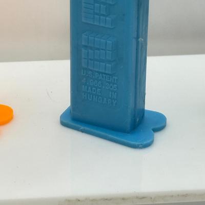 LOT 132: Pez Dispenser Collection: Funny Fruit, Bugs, Worm & More