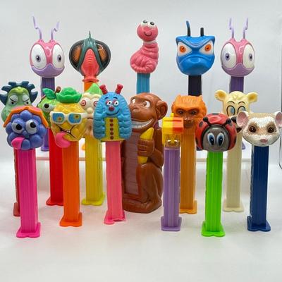 LOT 132: Pez Dispenser Collection: Funny Fruit, Bugs, Worm & More