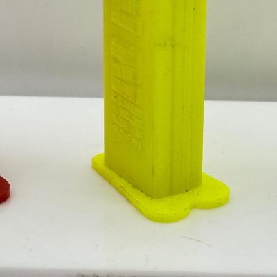 LOT 132: Pez Dispenser Collection: Funny Fruit, Bugs, Worm & More