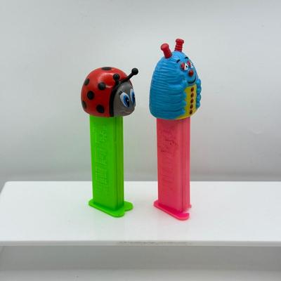 LOT 132: Pez Dispenser Collection: Funny Fruit, Bugs, Worm & More