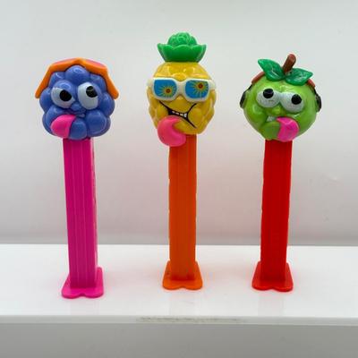 LOT 132: Pez Dispenser Collection: Funny Fruit, Bugs, Worm & More