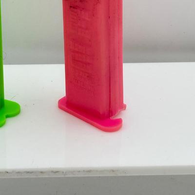 LOT 132: Pez Dispenser Collection: Funny Fruit, Bugs, Worm & More