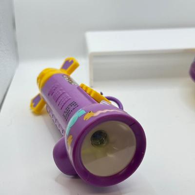 LOT 135: PEZ Collection: Flashlight, Toy Car, Monster Head Dispensers