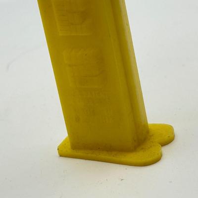 LOT 135: PEZ Collection: Flashlight, Toy Car, Monster Head Dispensers