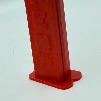 LOT 135: PEZ Collection: Flashlight, Toy Car, Monster Head Dispensers