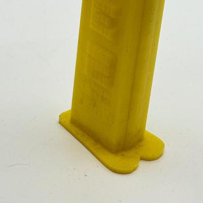 LOT 135: PEZ Collection: Flashlight, Toy Car, Monster Head Dispensers
