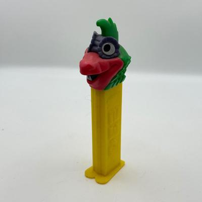LOT 135: PEZ Collection: Flashlight, Toy Car, Monster Head Dispensers