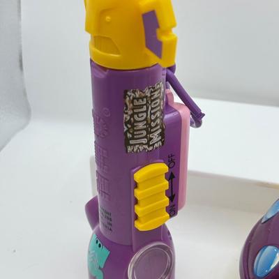 LOT 135: PEZ Collection: Flashlight, Toy Car, Monster Head Dispensers