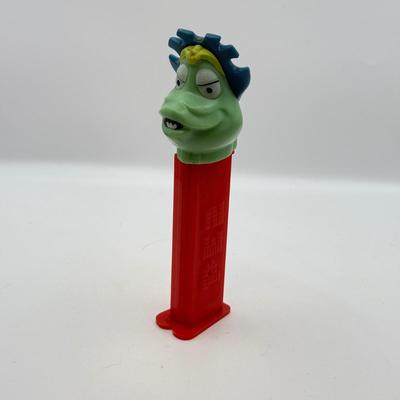 LOT 135: PEZ Collection: Flashlight, Toy Car, Monster Head Dispensers