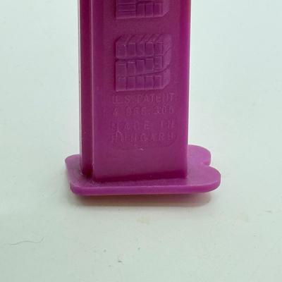 LOT 135: PEZ Collection: Flashlight, Toy Car, Monster Head Dispensers