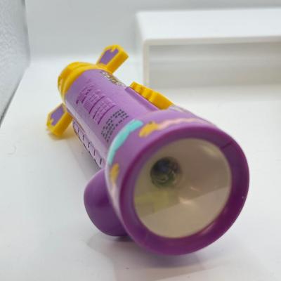 LOT 135: PEZ Collection: Flashlight, Toy Car, Monster Head Dispensers