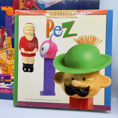 LOT 136: Pez Collector's Books & Dispensers from Simpsons & Bee Movie