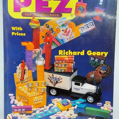 LOT 136: Pez Collector's Books & Dispensers from Simpsons & Bee Movie