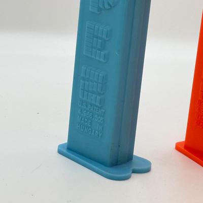 LOT 136: Pez Collector's Books & Dispensers from Simpsons & Bee Movie