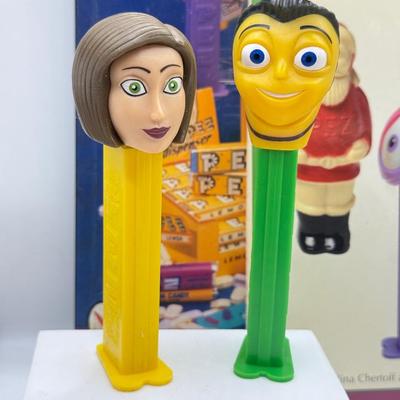 LOT 136: Pez Collector's Books & Dispensers from Simpsons & Bee Movie