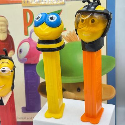LOT 136: Pez Collector's Books & Dispensers from Simpsons & Bee Movie