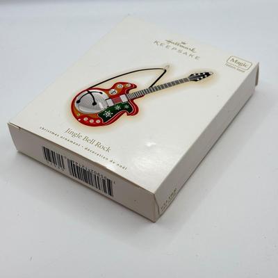 LOT 138: 2009 Hallmark Keepsake Magic Guitar Ornament in Box: Jingle Bell Rock