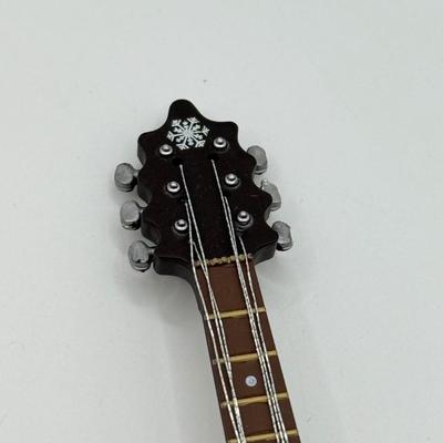 LOT 140: 2011 Hallmark Keepsake Magic Guitar Ornament in Box: Rockin' Around the Christmas Tree