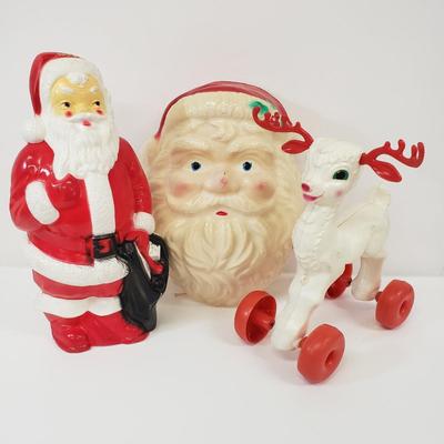 LOT 141: Vintage Empire Santa Blowmold & Reindeer Pull Toy with Santa Mask