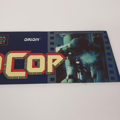 LOT 150: Robocop Glass Arcade Marquee, 2 Sonic Sega Games, Vintage Laser Gun