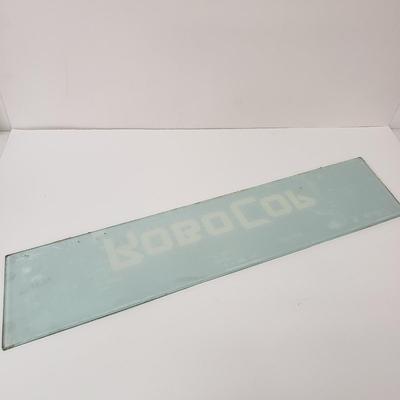 LOT 150: Robocop Glass Arcade Marquee, 2 Sonic Sega Games, Vintage Laser Gun